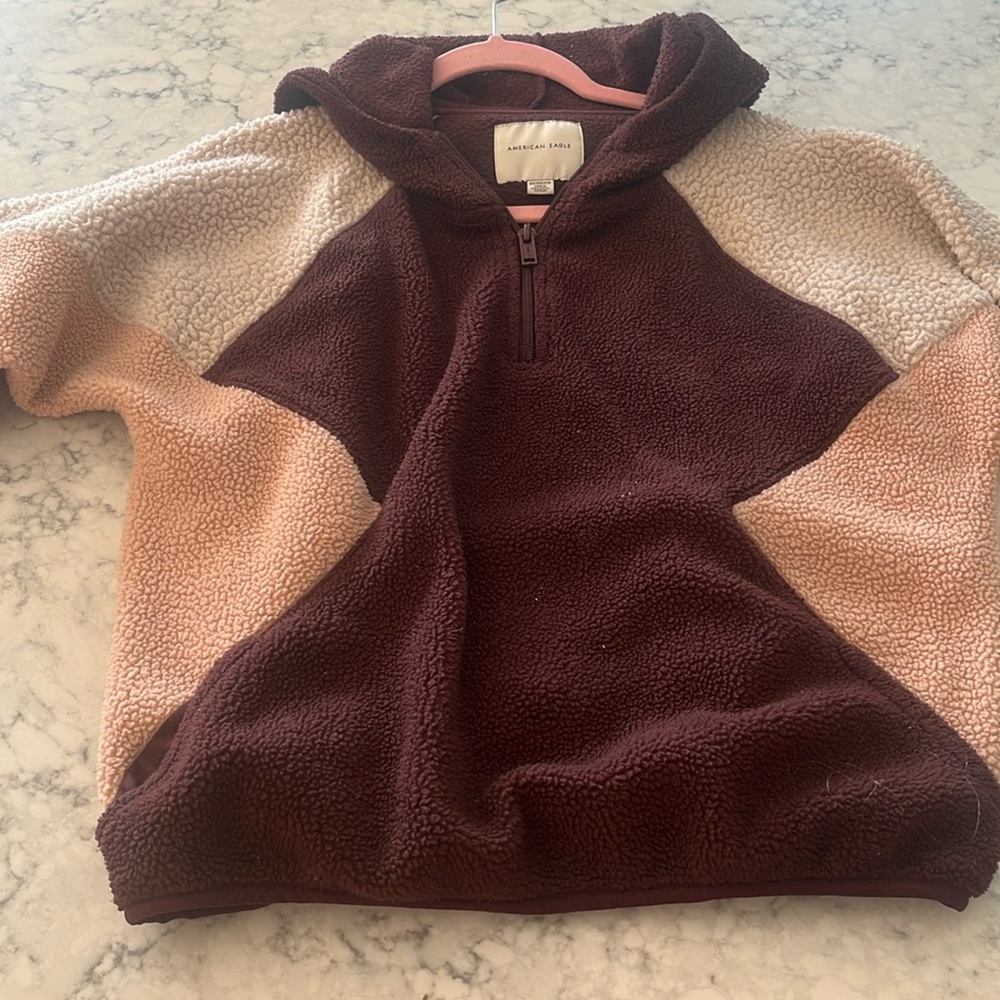 A purple pink and white fleece jacket from American eagle. Very warm
